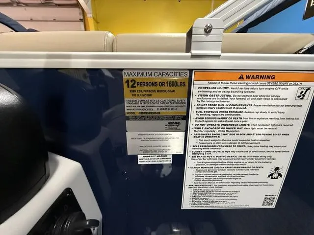 Slide: The Image of Capacity and warning labels on 2025 Godfrey Pontoons Xperience 2286 FSX boat. - 16