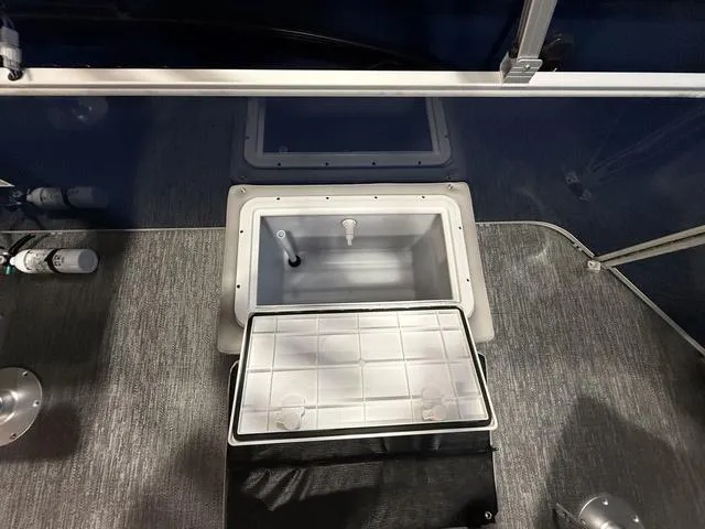 Slide: The Image of 2025 Godfrey Pontoons Xperience 2286 FSX interior with built-in storage compartment. - 24