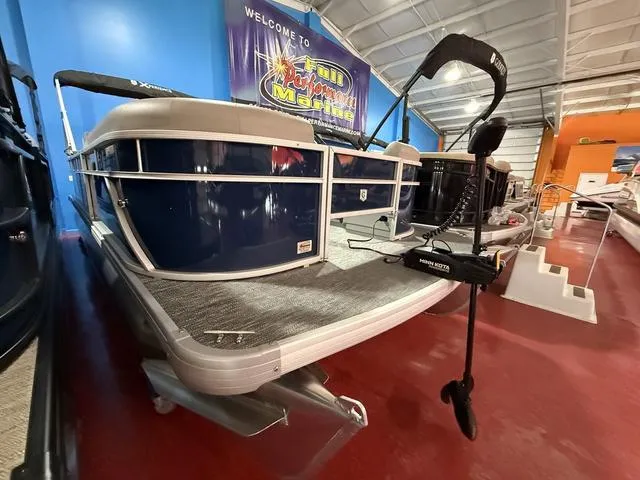 Slide: The Image of 2025 Godfrey Pontoons Xperience 2286 FSX displayed in showroom. - 3