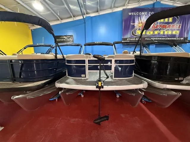 Slide: The Image of 2025 Godfrey Pontoons Xperience 2286 FSX displayed in a showroom. - 4