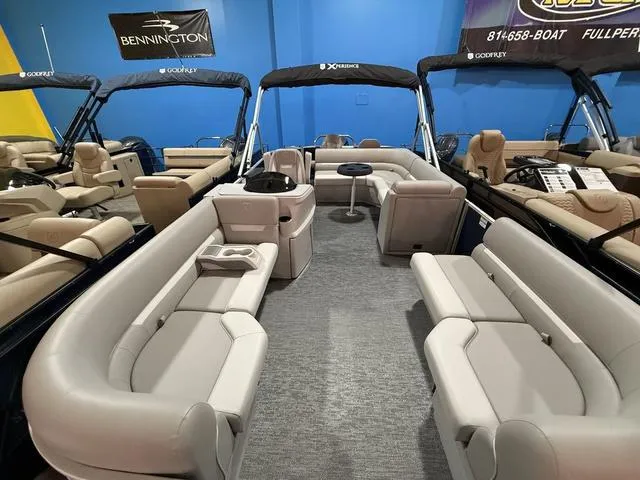 Slide: The Image of 2025 Godfrey Pontoons Xperience 2286 FSX interior with plush seating and modern design. - 6