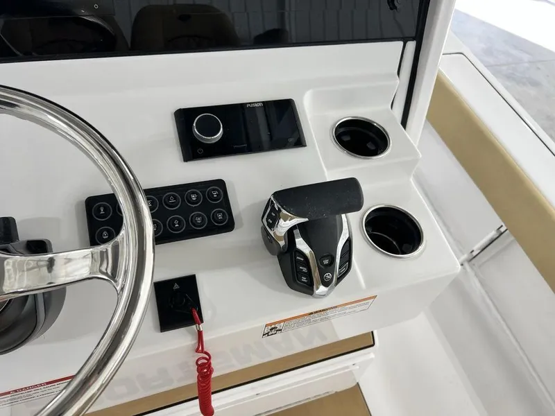 Slide: The Image of 2025 Sportsman Masters 247OE Bay Boat T-top with rod holders and speakers. - 17