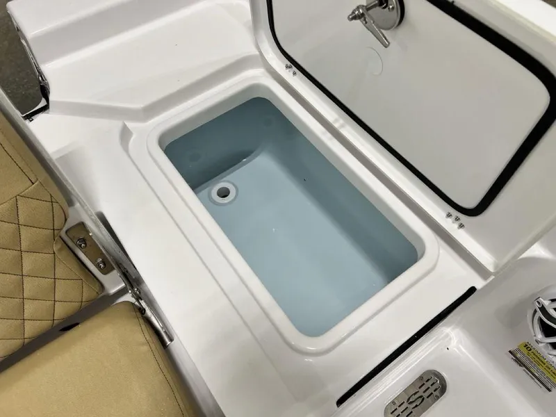 Slide: The Image of 2025 Sportsman Masters 247OE Bay Boat interior with storage compartments and sleek design. - 26