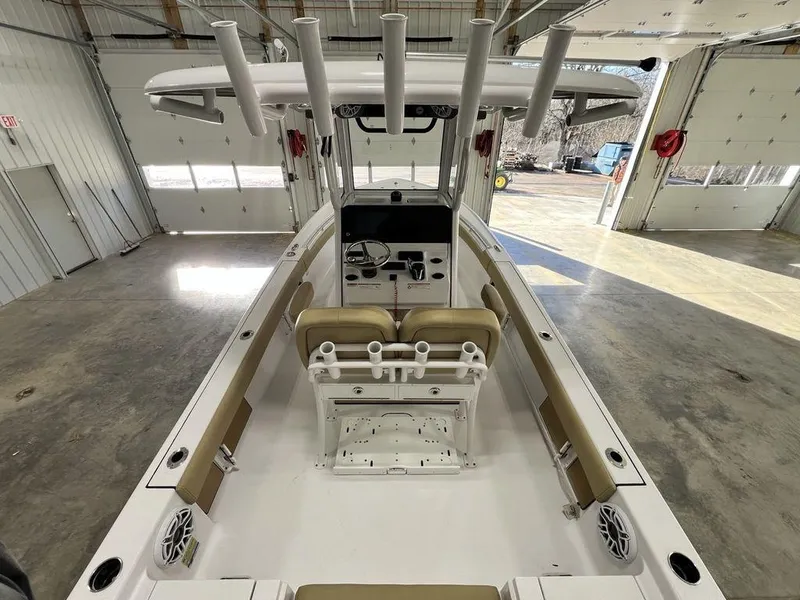 Slide: The Image of 2025 Sportsman Masters 247OE Bay Boat dashboard with speakers and NMMA certification. - 27