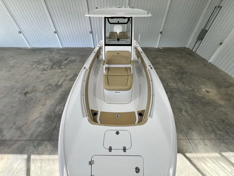 Slide: The Image of 2025 Sportsman Masters 247OE Bay Boat interior with modern console and speakers. - 28