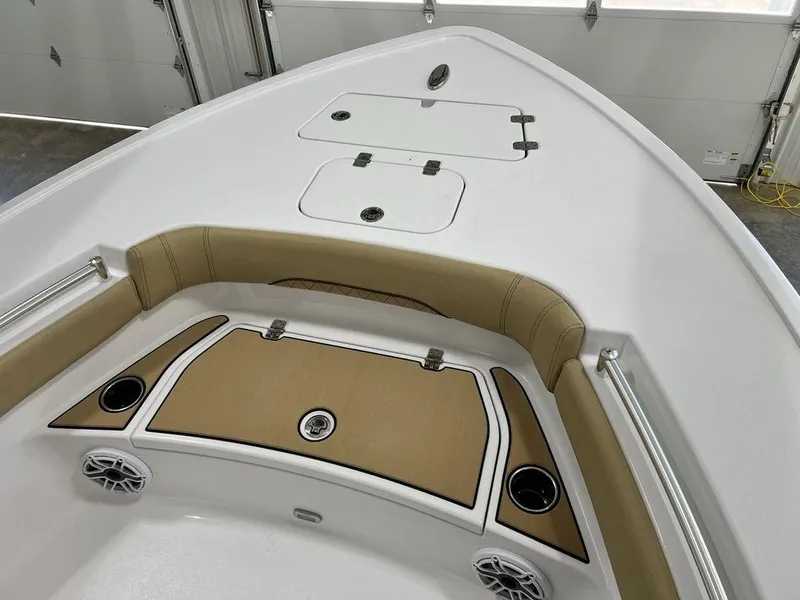 Slide: The Image of 2025 Sportsman Masters 247OE Bay Boat with Garmin trolling motor in a showroom. - 3