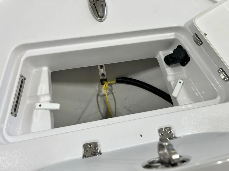 Slide: The Image of 2025 Sportsman Masters 247OE Bay Boat storage compartments and wiring details. - 5