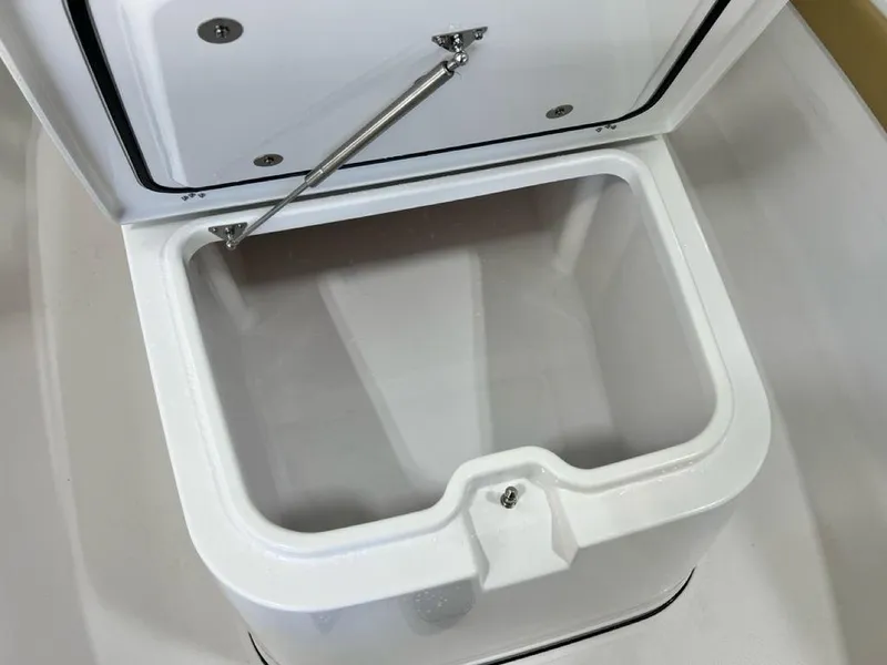 Slide: The Image of Garmin trolling motor on 2025 Sportsman Masters 247OE Bay Boat in a garage setting. - 9