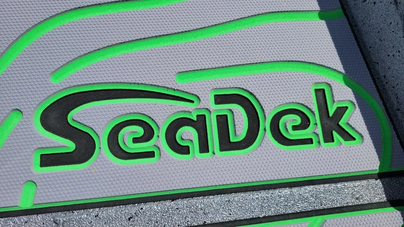 Slide: The Image of SeaDek logo on Xpress H24 Bay boat deck, 2025 model with Yamaha Vmax 250 SHO. - 10