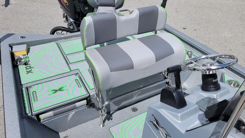Slide: The Image of 2025 Xpress H24 Bay boat interior with Yamaha Vmax 250 SHO engine, featuring stylish seating. - 15