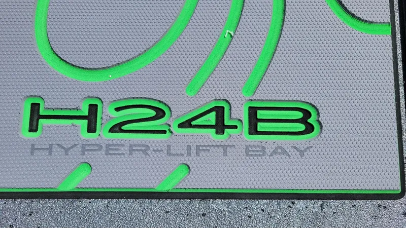 Slide: The Image of Xpress H24 Bay Hyper-Lift logo with green accents, 2025 model. - 19