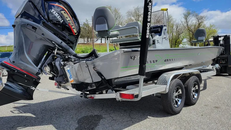Slide: The Image of 2025 Xpress H24 Bay boat with Yamaha Vmax 250 SHO engine on trailer. - 4