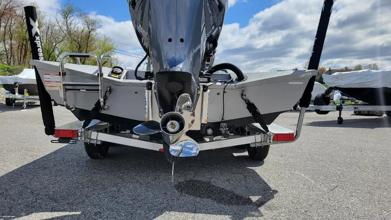 Slide: The Image of 2025 Xpress H24 Bay boat with Yamaha Vmax 250 SHO engine, rear view. - 5