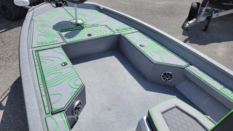 Slide: The Image of 2025 Xpress H24 Bay boat interior with Yamaha Vmax 250 SHO, featuring stylish green accents. - 8