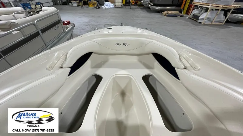 Slide: The Image of 2000 Sea Ray 210 BR boat interior at Marine Center, Indiana showroom. - 12