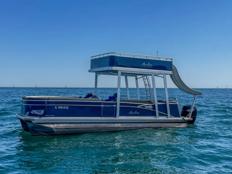 Slide: The Image of 2022 Avalon Catalina FunShip pontoon boat with slide on open water. - 3