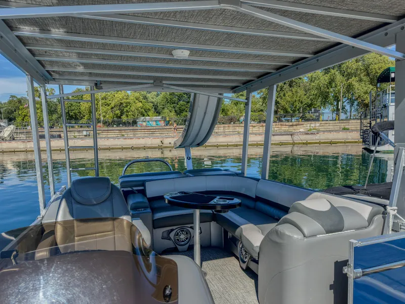 Slide: The Image of 2022 Avalon Catalina FunShip pontoon boat with slide, docked on a sunny day. - 5