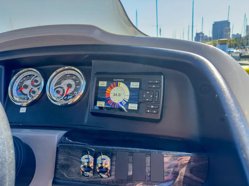 Slide: The Image of Dashboard of 2022 Avalon Catalina FunShip with gauges and Garmin display. - 9