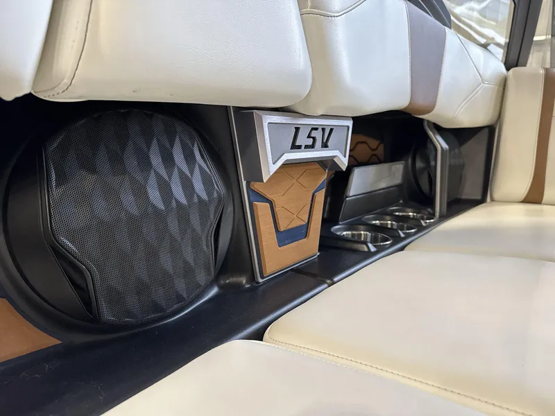 Slide: The Image of 2024 Malibu 23LSV interior with premium seating and speaker detail. - 14