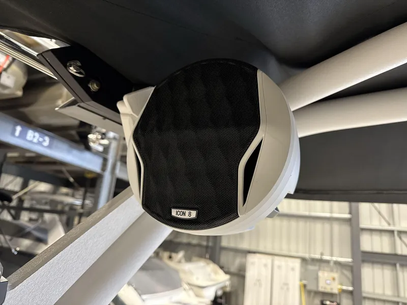 Slide: The Image of 2024 Malibu 23LSV boat speaker, Icon 8, mounted on a metal frame. - 15