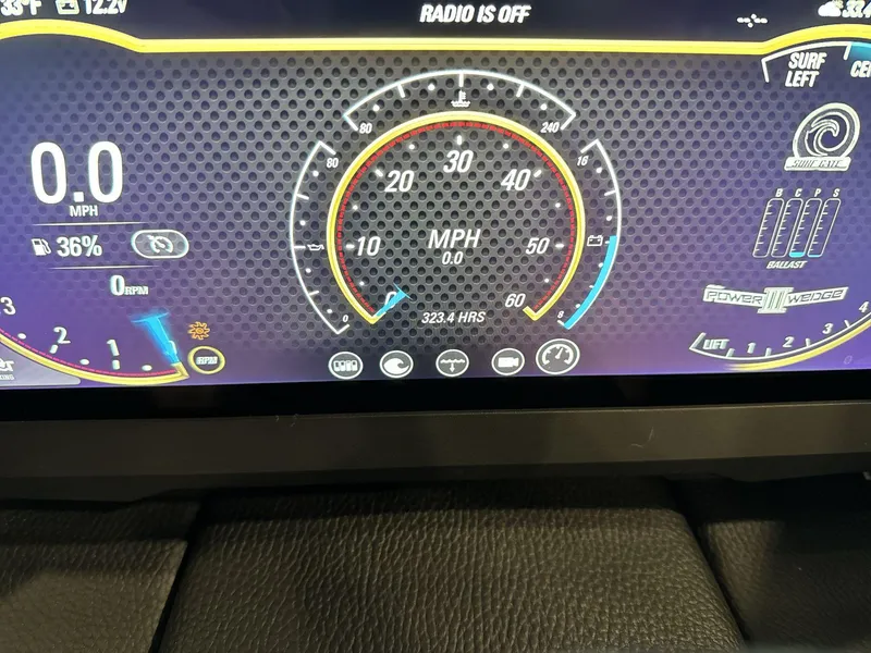 Slide: The Image of 2024 Malibu 23LSV dashboard display showing speedometer and control settings. - 16