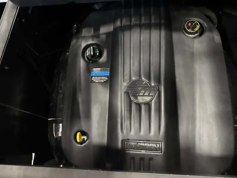 Slide: The Image of 2024 Malibu 23LSV Monsoon engine close-up, showcasing sleek design and branding. - 17