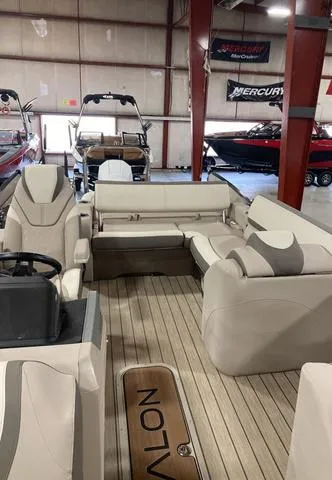 Slide: The Image of 2025 Avalon 23 Catalina Versatile Rear Bench boat interior with luxurious seating. - 4