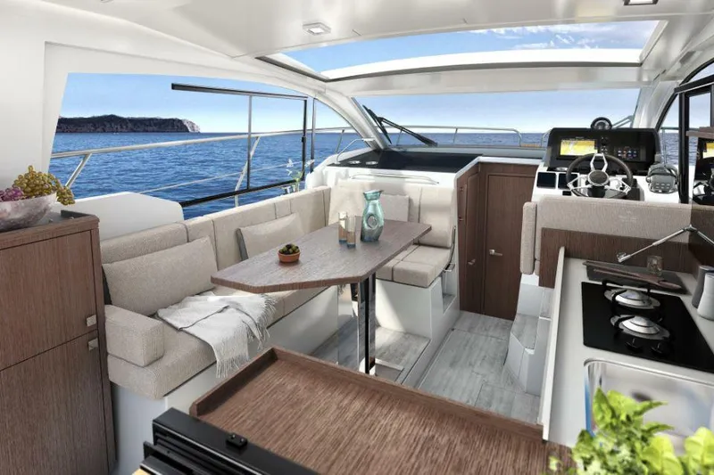 Slide: The Image of Luxurious interior of 2025 Sealine C335V yacht with modern kitchen and seating area. - 15