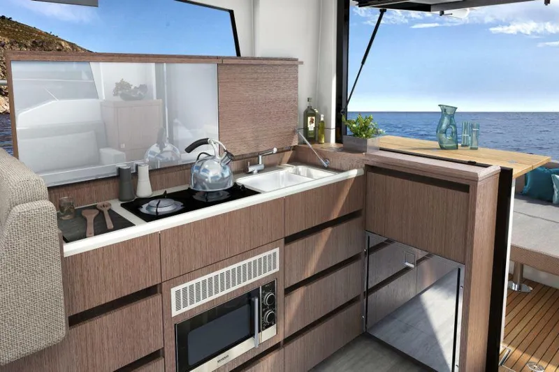 Slide: The Image of Modern kitchen interior of 2025 Sealine C335V yacht with ocean view. - 17