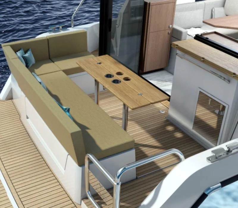 Slide: The Image of 2025 Sealine C335V yacht deck with seating, table, and ocean view. - 18