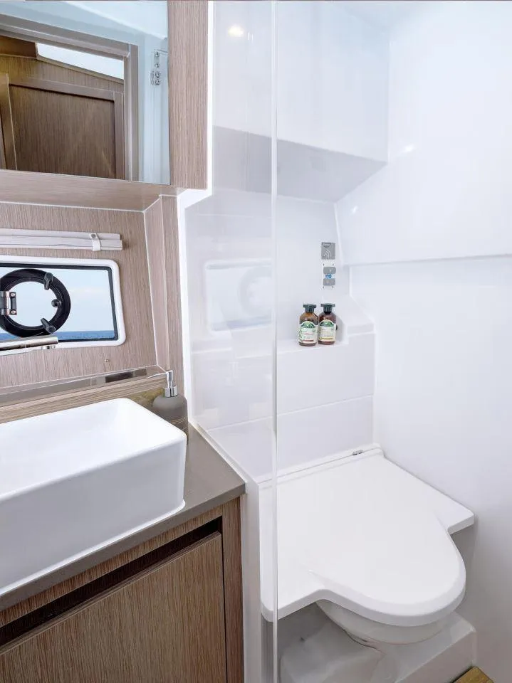 Slide: The Image of 2025 Sealine C335V yacht bathroom with modern sink and toilet. - 24