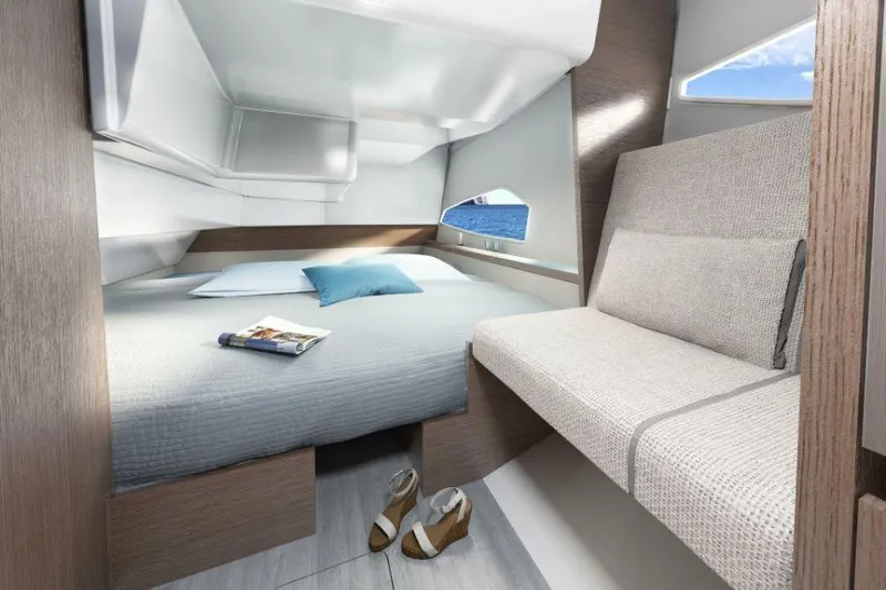 Slide: The Image of Luxurious interior of 2025 Sealine C335V yacht with cozy bed and seating area. - 26