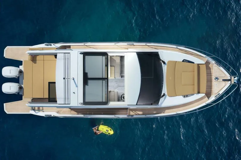 Slide: The Image of Top view of 2025 Sealine C335V yacht on blue water. - 5