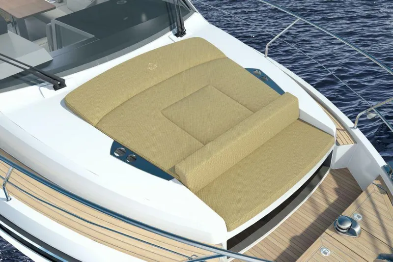 Slide: The Image of 2025 Sealine C335V yacht with spacious sunbed on deck, surrounded by ocean water. - 7