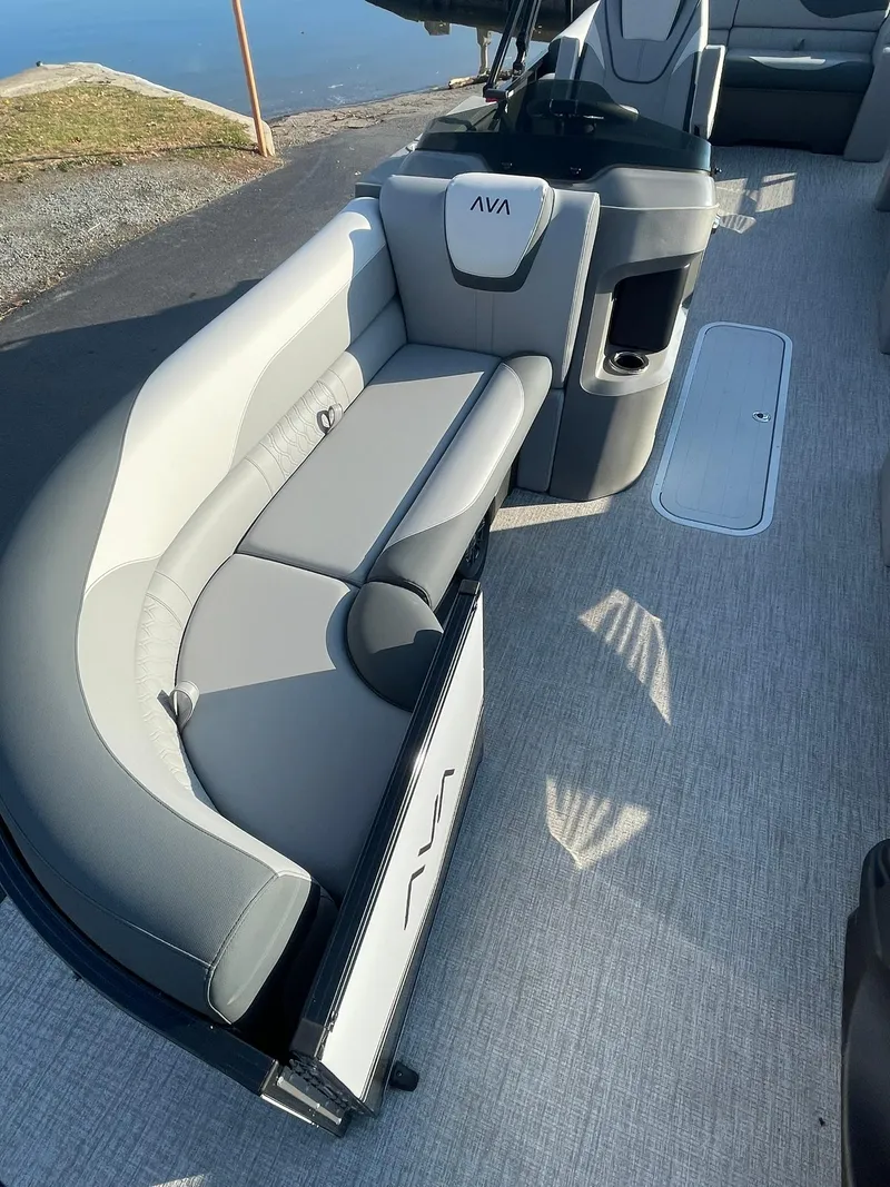 Slide: The Image of 2025 Avalon LSZ ELITE boat interior with sleek gray seating and modern design. - 11
