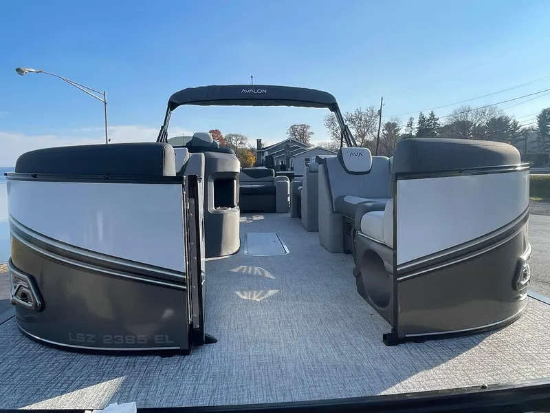 Slide: The Image of 2025 Avalon LSZ ELITE pontoon boat with spacious seating and modern design. - 9