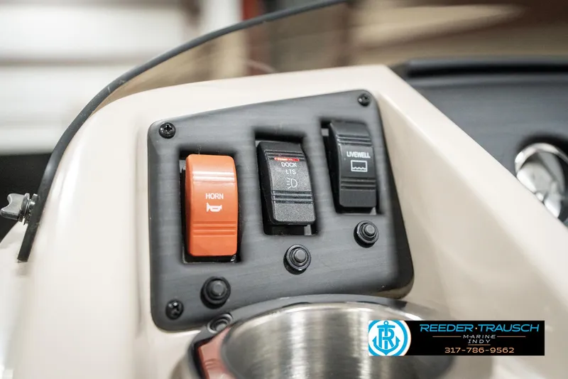 Slide: The Image of Control panel of 2019 Bennington 21 SLX boat with horn and switches. - 32