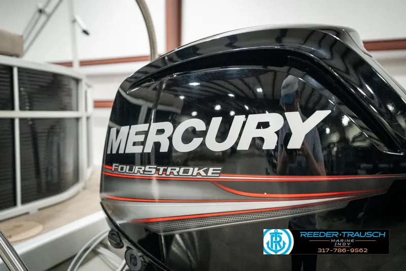 Slide: The Image of Mercury FourStroke engine on 2019 Bennington 21 SLX boat, indoor storage. - 46