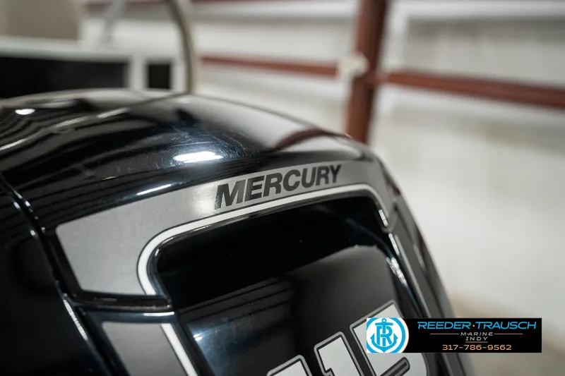 Slide: The Image of Close-up of a Mercury engine on a 2019 Bennington 21 SLX boat. - 47