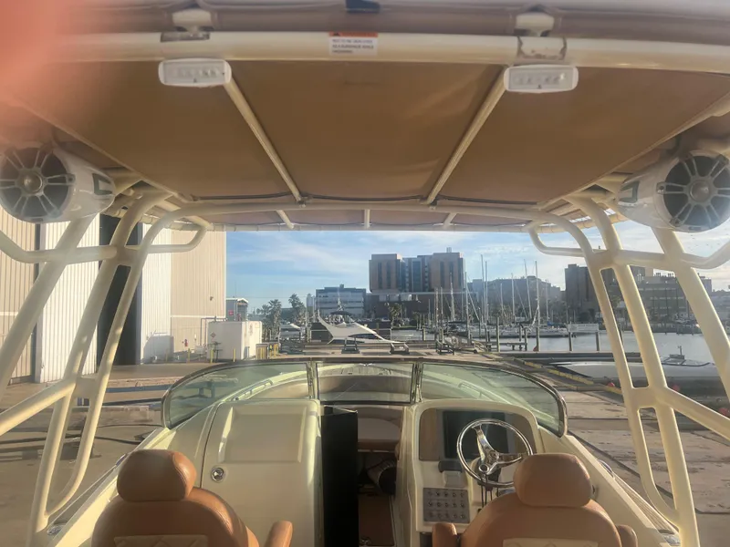 Slide: The Image of 2017 Chris-Craft Calypso boat interior with marina view in the background. - 5