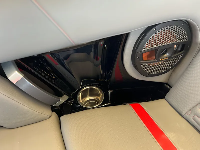 Slide: The Image of 2025 MasterCraft X22 interior with speaker and cup holder detail. - 12