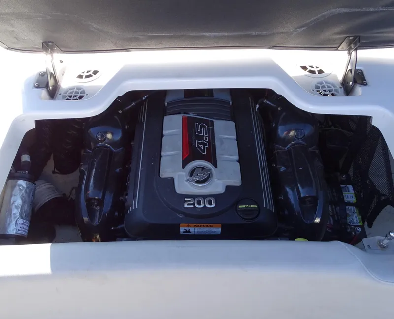 Slide: The Image of Regal 1900 ES Bowrider 2021 engine compartment with 4.5L 200 HP engine. - 11