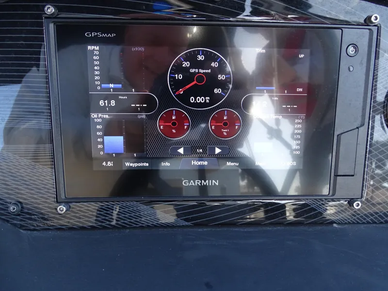 Slide: The Image of Garmin GPS display on 2021 Regal 1900 ES Bowrider dashboard showing speed and RPM. - 3
