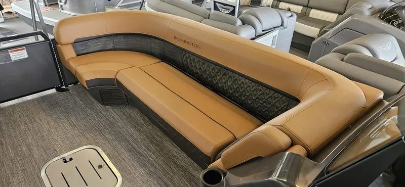 Slide: The Image of 2025 Bennington 24 MFB boat interior with luxurious tan seating. - 4