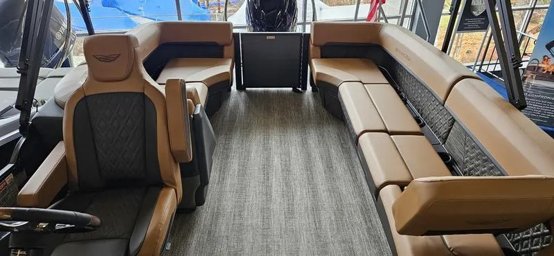 Slide: The Image of Luxurious interior of 2025 Bennington 24 MFB pontoon boat with plush seating. - 7