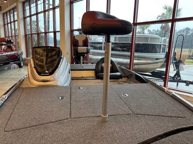 Slide: The Image of 2025 Nitro Z17 boat interior with seating and storage compartments. - 2