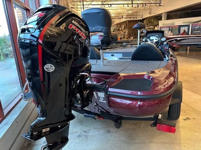 Slide: The Image of 2025 Nitro Z17 boat with Mercury engine in showroom. - 3