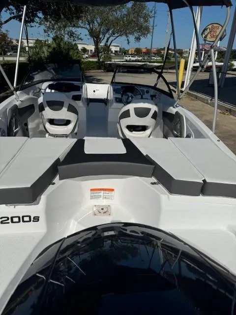 Slide: The Image of 2025 Tahoe 200 S boat with sleek interior design and comfortable seating. - 4
