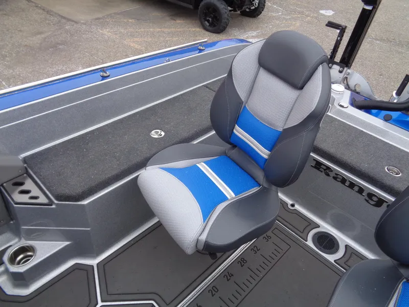 Slide: The Image of 2024 Ranger 622FS Pro boat seat with blue and gray design. - 10