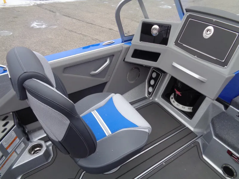 Slide: The Image of 2024 Ranger 622FS Pro boat interior with modern dashboard and seating. - 13